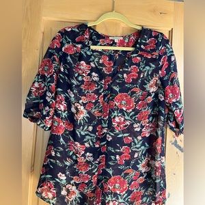 Semi-sheer navy floral shirt with 3/4 sleeves. Worn only a couple of times.